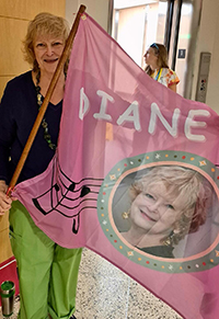 Diane Mills holding Diane flag